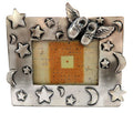 Pewter picture frame with moons and stars and a pair of baby shoes with wings in the top right corner pf88