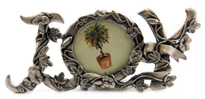 Pewter picture frame of the letters J-O-Y and the picture is held inside the letter O pf90